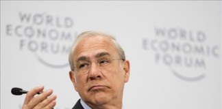 El mexicano José Ángel Gurría, secretario general de la OCDE, expuso los alcances del reporte "La financiación del cambio climático en 2013-14 y el objetivo de 100.000 millones de dólares", en el marco de las reuniones anuales de las juntas de gobernadores del Fondo Monetario Internacional (FMI) y del Banco Mundial (BM). EFE/Archivo